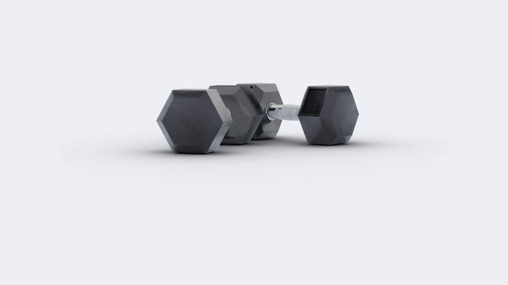 Two dumbbells on a light surface